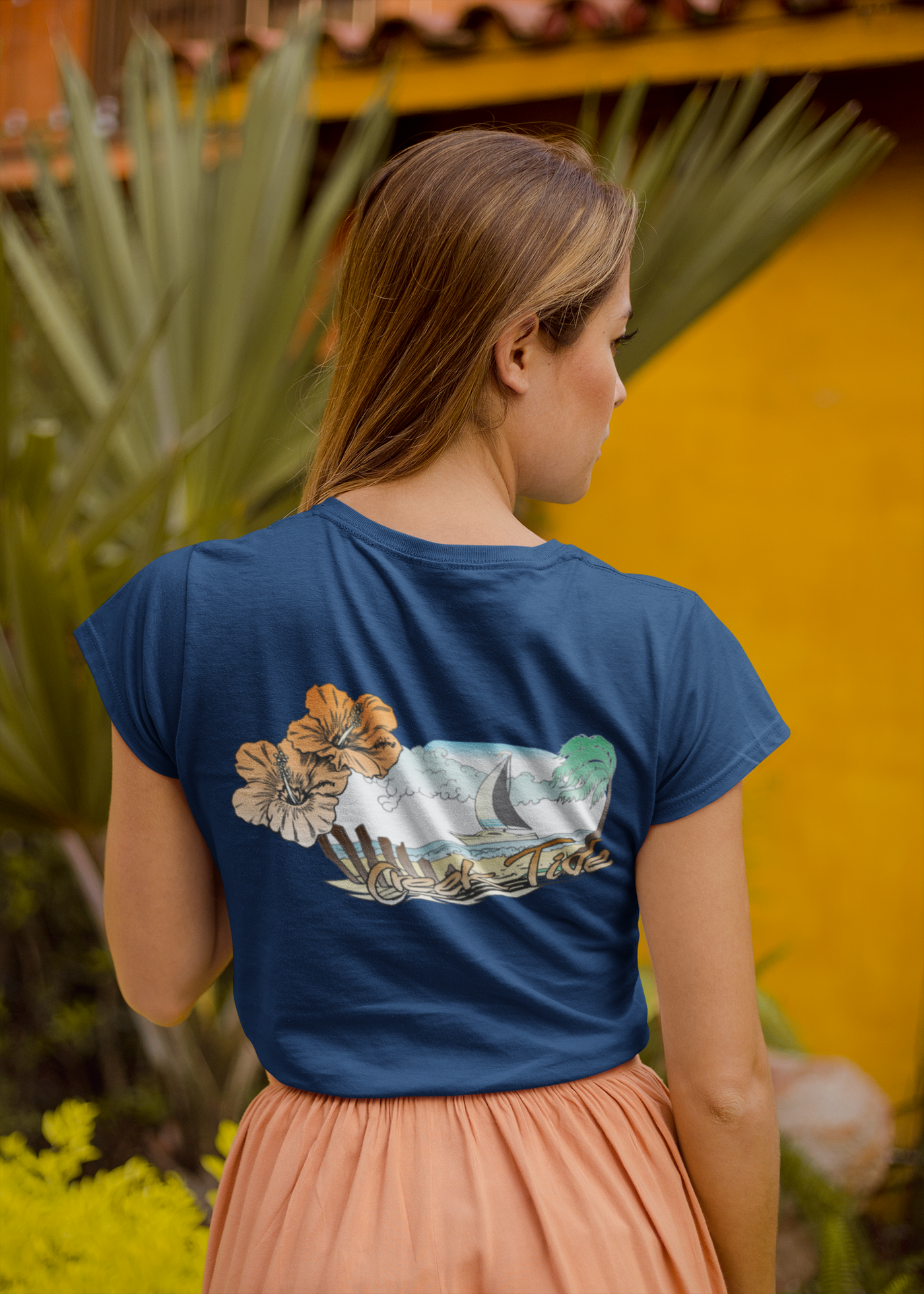 back view t shirt mockup of a woman with long straight hair wearing a blue creek tide shirt